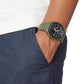 Image d'une montre g-shock militaire de couleur verte porté par un homme